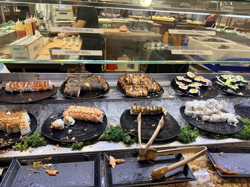Colorful food spread beside clean seating